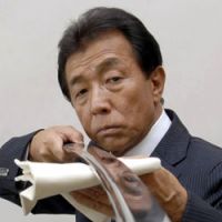 Sword polisher Eichi Yoshikawa shows off an Edo Period blade. The soul of the samurai on show