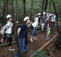 Positive thinking: Chuo University students from the teacher-inspiring seminar referred to in this column head off to visit a bat cave near Mount Fuji. Don't give up on Japan's kids
