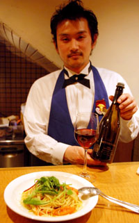 Fujiya Honten Wine Bar Manager Rentaro Maruyama at the original Le Train Bleu.