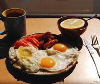 Served with eggs, grits (left) are crucial to a Southern breakfast. Pursuing the flavor of the American South