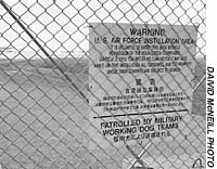 A sign warns off potential intruders from a U.S. military installation on Okinawa. Press freedom