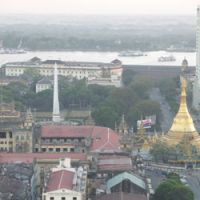 Looking over the rooftops of Yangon (above), with the gilded Sule Pagoda, where many demonstrators gathered last September, on the right, and the Town Hall on the left, where many were initially jailed; a sign (below) which includes the word Tatmadaw (“the military”) prompted old Burmese men to say to me: “But they already have.” Stricken land of soldiers and slaves