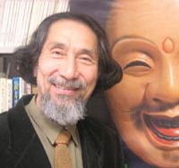 Kansai University Sociology Professor Yoji Kimura (above) smiles in his office beside a poster of Fuku-no-kami (the God of Happiness), and examines one of his computerized Laughogram readouts (below). Belly-laughs boffin puts mirth to the test