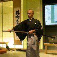 Cool cuts: The traditional martial art of iaido, which involves drawing a Japanese sword (above) and wielding it to strike blows in all manner of ways, requires 100-percent focus, even from a kneeling position (below). Hack, slash and hew — all with Zen in mind