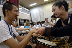 Don’t mind the gap: Universal Camp attendees learn drumming, party with the locals and get a lesson in sign language on Hachijojima, one of the Izu islands, last month Access all areas: camping trip offers no-holds-barred insight into disability