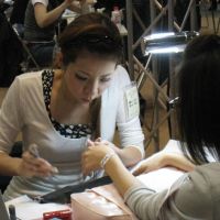 Nail-biting: A 5th World Nailist Championship contestant works on French sculpture nails. 'Simple and severe' in World Nailist finals