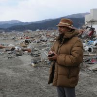 Rajib Shaw inspects a tsunami-ravaged area of Rikuzentakata, Iwate Prefecture, during his visit to Tohoku in early April. Disaster expert seeks better tsunami defense