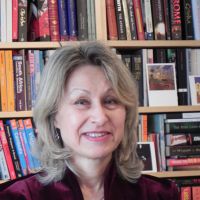 Lesley Downer pictured in her study at her North London home during her recent interview for The Japan Times — and a few of her best-selling books on Japan (left). Author Lesley Downer's romance with Japan is no fleeting affair