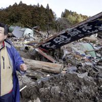 Determined to rebuild: Yasuhiko Konno, owner of Suisen sake brewery, stands in front of what used to be his brewery in Rikuzentakata, Iwate Prefecture. As the initial shock of the disaster fades, many are now focusing on rebuilding. Sake brewer vows to rebuild after tsunami