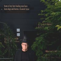 Celebrating man's best friend: Joseph Kosuth stands outside The Dog House, his public work of art in Shibuya, Tokyo, dedicated to Bacon, Joni Waka's famous Irish Wolfhound. Being in the doghouse is not always a bad thing