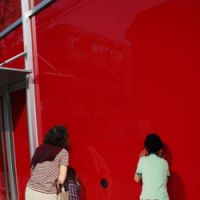 Peekaboo: The shop window of Nomura Premium Goods in Aoyama, a baby-goods shop opening next month Sake and sculptures in an Aoyama backstreet