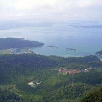 Breathtaking: Some of the 99 islands that comprise the Langkawi archipelago can be seen in the distance as a cable car makes the 705-meter climb up the peak of Gunung Mat Cincang on the island of Palau Langkawi, Malaysia. Getting high and then horizontal in Langkawi
