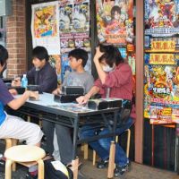 Final fantasy: Kids hang out at video- and card-game shop Max Game. Gaming Moto Azabu