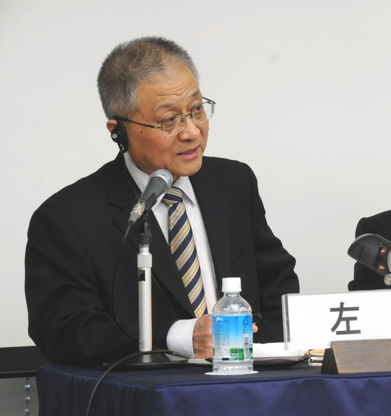 Zuo Xuejin from the Shanghai Academy of Social Sciences discusses China’s aging population and its socioeconomic impact during a Feb. 20 seminar in Tokyo. Japan-like fertility rate, aging population pose threats to China