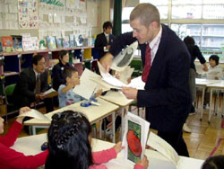 Early starters: Students take part in an English class at an elementary school in Minato Ward, Tokyo, in 2008. Elementary schools to get English