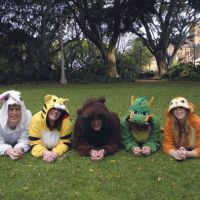 They just pelt like it: Friends (from left) Laurence Bye, Sarah Dale, Patrick Westhoff, Siobhan Stewart and Claire Delohery wear animal onesies in Sydney's Hyde Park recently. Japan costumes bring out Aussie 'wild side'