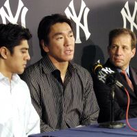 Special pairing: Agent Arn Tellem (right) appears at a news conference with Hideki Matsui in 2005 after the slugger agreed to a new contract with the New York Yankees. Tellem's take: Matsui a special person
