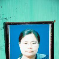 No justice: A photo of Thangjam Manorama Devi hangs on the wall of her family home in Imphal, India, recently. Indians allege army in war of rape, killing