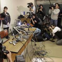 Bad timing: Ryuji Sonoda, head coach of Japanese women’s judo national team, bows before a press conference in Tokyo. Sonoda resigned over accusations he physically abused female judoka at a training camp before the London Olympics. Judo scandal casts doubt on Olympic bid