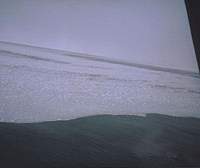 A sea-ice front in mist from 150 meters over the Sea of Okhotsk. Patrolling the seas from on high