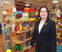 Fun and profit: Bornelund Inc. President Hiroko Nakanishi shows off some of the imported toys available at the company’s store in Shibuya Ward, Tokyo, earlier this month. Seller of educational toys finds a niche