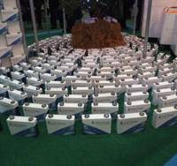 All charged up: High-capacity lithium-ion battery cells made by Tokyo-based battery-producer Eliiy Power Co. are on display Tuesday during the two-day technology fair in Kawasaki. Kawasaki touts eco-technology