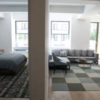 Living large: A model one-bedroom apartment is pictured at the 99 John Deco Lofts condo building in New York in July 2010. Prices in the Big Apple are rising rapidly as buyers venture back into the housing market. NYC condo prices go through the roof