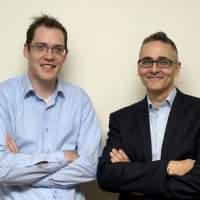 Powers of persuasion: Behavioral Insights Team Director David Halpern (right) and Deputy Director Owain Service pose for a photograph in London on Jan. 14. Britain shapes good citizens with a gentle 'nudge'