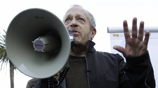 Fighting for the 99 percent: Former U.S. Secretary of Labor Robert Reich speaks to Occupy San Francisco demonstrators at Justin Herman Plaza on Oct. 19, 2011. Now teaching at the University of California, Berkeley, Reich blames anti-union legislation and market deregulation for the yawning chasm that has grown between America’s wealthy and middle class since the late 1970s. The movie exposing the lies at the heart of U.S. capitalism