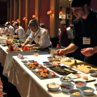 Prepping to win: Pepi Anevski (front), of Umami restaurant in Copenhagen, was named Chef of the Year at Japan’s first World Sushi Cup for his winning dish of season-inspired sushi. Top chefs explore international accents to sushi