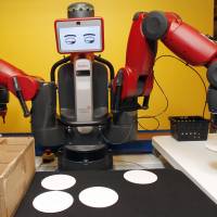 Meet your future boss: The Baxter robot was designed to work alongside real people. Its face changes expressions to warn people what it is doing. Will robots end up creating jobs or end them?