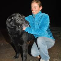Amy Chavez weighs only slightly more than this Labrador retriever. Biiiiig baby! — Japanese get taller and skinnier, but not bigger