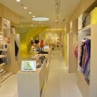 Bright sights: The interior and exterior of Kate Spade Saturday’s first flagship store in Omotesando, Tokyo, are in an unmissable canary yellow. Kate Spade Saturday chooses Tokyo for its first flagship