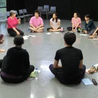 Captive audience: Resident instructor Lorna Marshall speaks to students at the New National Theatre, Tokyo’s Drama Studio. Aspiring thespians get help in realizing dreams