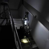 Slinky move: Quince moves down stairs at Chiba Institute of Technology in June. Domestic robots failed to ride to rescue after No. 1 plant blew
