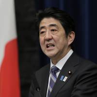 Man with the plan: Prime Minister Shinzo Abe speaks at a news conference on the second anniversary of the Great East Japan Earthquake at his office in Tokyo Monday. Road map for Fukushima evacuees due in summer: Abe