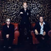 Starting an end: The U.S. band R.E.M. (from left, Mike Mills, Michael Stipe and Peter Buck), who wrote the 1987 song “It’s the End of the World as We Know It (And I Feel Fine)” with former drummer Bill Berry, may have called it quits in September 2011, but books using the title “The End of …” seem to have no end, Carlos Lozada asserts. It's the end of everything as we know it (perhaps)