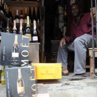 Bubble economy: Champagne on sale at a roadside shop in Lagos. Recent data has shown Nigeria to be among the fastest-growing countries in the world for Champagne consumption. Nigeria's elite make country toast of Champagne sellers