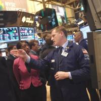 Taking stock: Traders work the floor of the New York Stock Exchange on Tuesday. AP Twitter hacking shakes up stocks