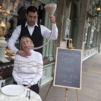 Force-fed: PETA's Ingrid Newkirk, with a funnel of feed in her mouth, protests the sale of foie gras in London last month. PETA founder Ingrid Newkirk: making the fury fly