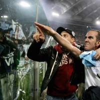 “From the heart”: Lazio forward Paolo Di Canio gestures toward fans at the end of a match against Roma at Rome’s Olympic stadium in January 2005. Di Canio was named the new coach of Premier League strugglers Sunderland on March 31, a move that led to the resignation from the club’s board of former Foreign Minister David Miliband. Pilgrims see only the good in Mussolini