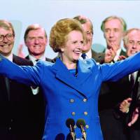 Iron will: British Prime Minister Margaret Thatcher acknowledges supporters at the end of the Conservative Party conference in Blackpool in October 1989. Global tributes flow for 'Iron Lady' Thatcher