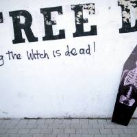 Grave memories: A mock coffin of former British Prime Minister Margaret Thatcher rests against graffiti in the Bogside area of Londonderry, Northern Ireland, Wednesday, the day of her funeral. Thatcher was hated by Irish republicans. A journey across Margaret Thatcher's England