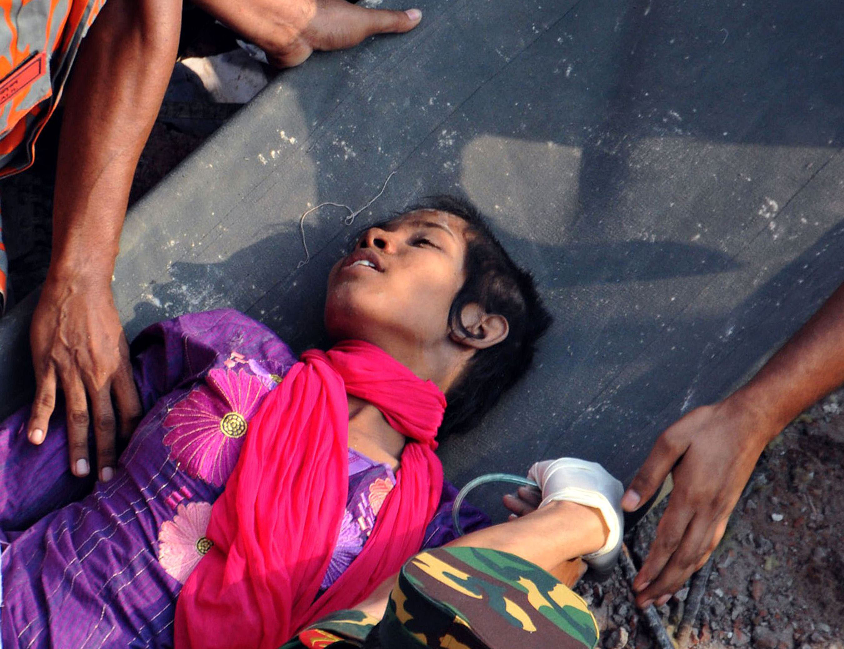 Rescuers Find Lucky Survivor In Collapsed Bangladeshi Building The