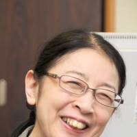 Still smiling: High-flying bureaucrat Atsuko Muraki became an unlikely heroine when she was forced to take on Japan’s powerful prosecutorial machine after refusing to bow to charges that she had falsified public documents in connection with a postage fraud case. After a grueling period in detention and a trial it transpired had included falsified evidence, the mother of two was finally acquitted in September 2010. Here, she is pictured during her recent JT interview held in the Cabinet Office, where she now works. Fighter for justice
