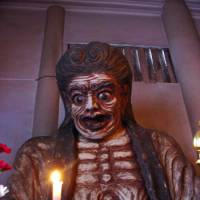 Hag out of hell: A 19th-century sculpture of flesh-stripping Datsueba, ghoul of the Buddhist underworld, stands at Taisouji Temple in Shinjuku 2-chome, Tokyo. Readers' tales: Beginnings, terrifying journeys and terrible ends