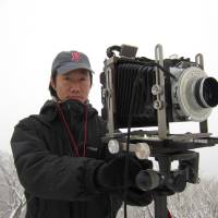 Eyewitness: Tomoki Imai, whose new “Semicircle Law” book is the result of two years of photographing Tepco’s Fukushima No. 1 nuclear power plant from afar. Fukushima photos focus on what can't be seen