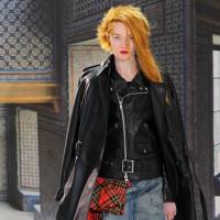 Rag trade: A model wearing pieces from the Junya Watanabe Comme des Garcons archive and Loewe’s Winter 2013 collection clutches a limited-edition Amazona bag from the new Loewe-Watanabe collaboration range. Loewe goes punk with Junya Watanabe collaboration
