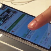 No touch screen: The hover feature added to DoCoMo smartphones is demonstrated at the launch event for the company's summer 2013 lineup. Japan's cellphone lineups for summer 2013 — fit and focused
