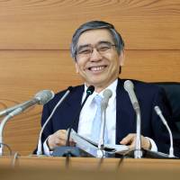 Better times: Bank of Japan Gov. Haruhiko Kuroda holds a news conference in Tokyo on April 26. Kuroda stimulus policies backfire as mortgage costs rise
